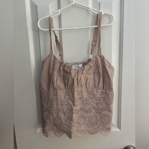 Nude colored cropped tank
